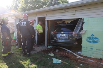 Indianapolis Driver Drives Through Home While Unloading Firewood