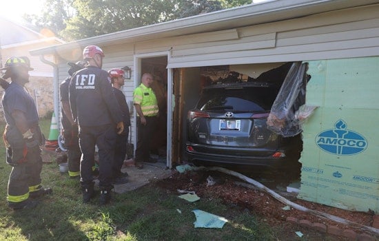 Indianapolis Driver Drives Through Home While Unloading Firewood