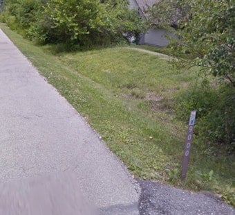 Indianapolis Sues North-Side Couple Over Backyard Land Near Monon Trail