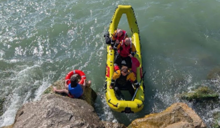 Kayaker Stranded On Euclid Beach Rocks As Waves Crash, Fire Crews Rescue