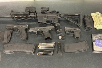 Lakewood Truck Blocked In Traffic, Felon Found With Four Guns Inside