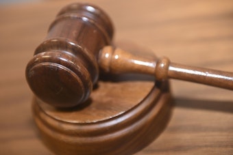 Milwaukee Boy, 11, Dies After Shooting Himself; Caretaker Now Charged and On the Run