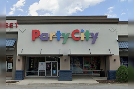 NetCost Market Plants European Grocery Flag Across From Old Regency Mall