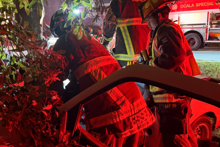 Ocala Crews Cut Two From Pickup Pinned Between Tree and Fence