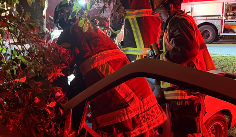 Ocala Crews Cut Two From Pickup Pinned Between Tree and Fence