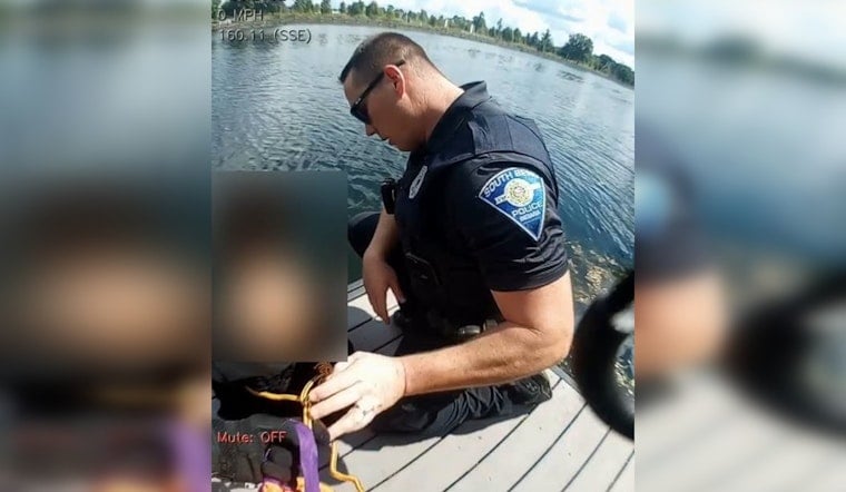 South Bend Officers Coax Autistic Child Off Riverside Dock Ledge
