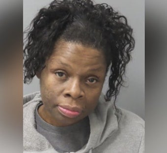 Woman, 50, Held Without Bond After Wedging Burning Fabric Into Peck Street Door