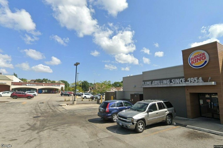 Bald Man in Cadillac SUV Gestures to Girl, 15, as SUV Circles Portage Park Bus Stop