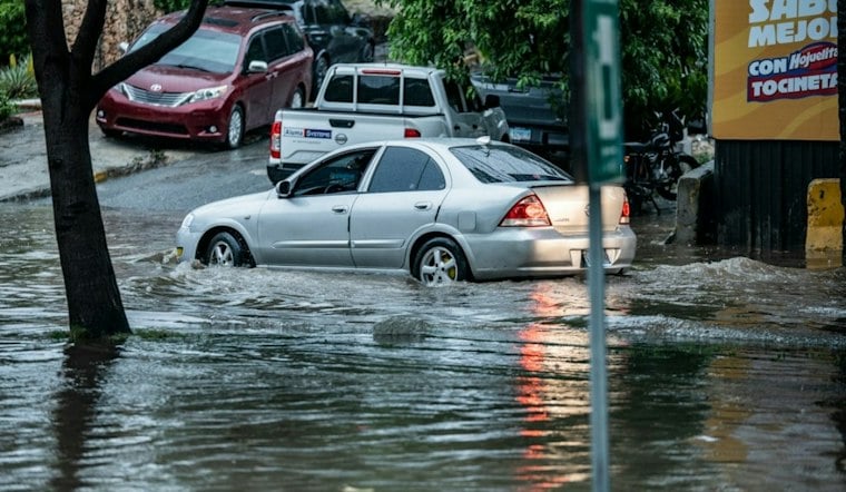 Belmont Road Collapse Traps SUV During Coastal Storm; Cause Remains Unknown