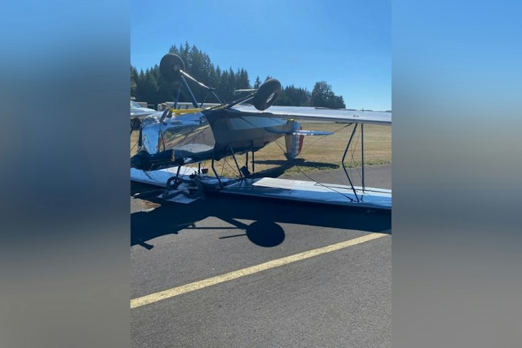 Biplane Flips After Pilot Reports Cabin Smoke Landing at Camas' Grove Field