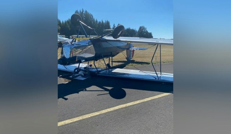 Biplane Flips After Pilot Reports Cabin Smoke Landing at Camas' Grove Field