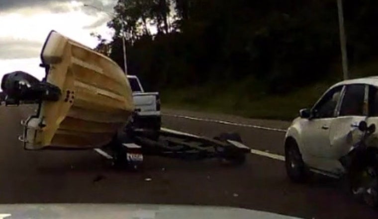 Boat Skids Down I-75 In Pasco County After SUV Crashes Into Ramp Curve