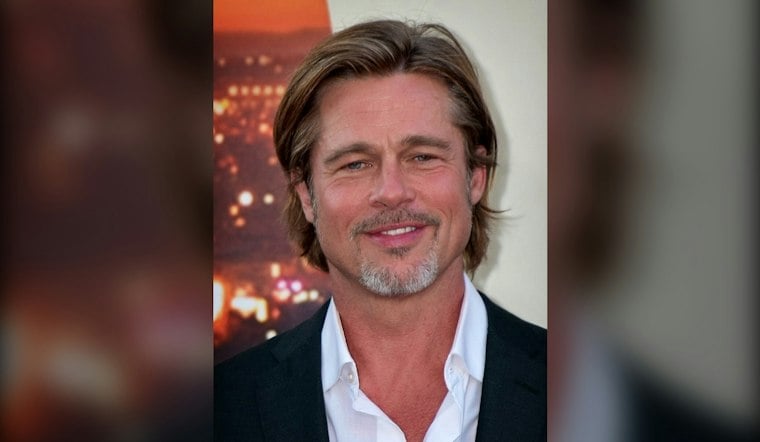 Brad Pitt Sneaks Into Edwards Theater, Poses With Local Kids