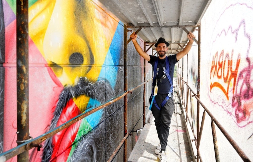 Brazilian Artist Kobra Paints 11,000-Square-Foot Rock Mural on Cleveland Garage
