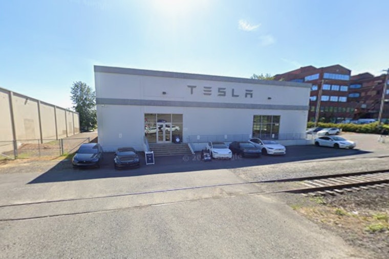 Car Slams Into South Portland Tesla Dealership, Three Rushed to Hospital
