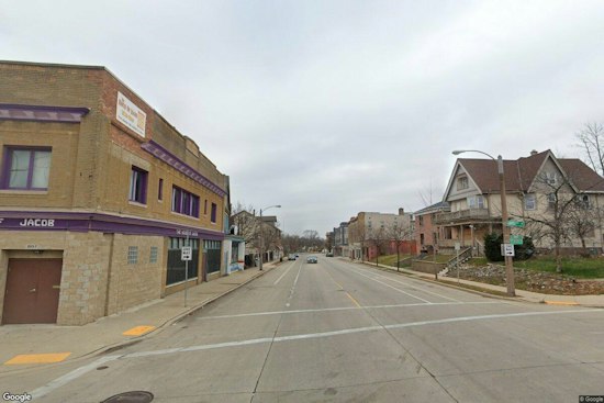 Child Struck Crossing Street Near Milwaukee's Washington Park, Car Ends Up on Fence