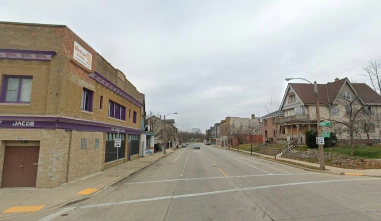 Child Struck Crossing Street Near Milwaukee's Washington Park, Car Ends Up on Fence