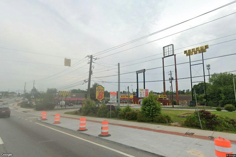 College Park Super 8 Must Pay $164M to Girl Trafficked There at Age 15