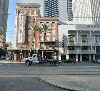 Court Orders Trial Over Who Buys Shuttered Palace Café Building on Canal Street