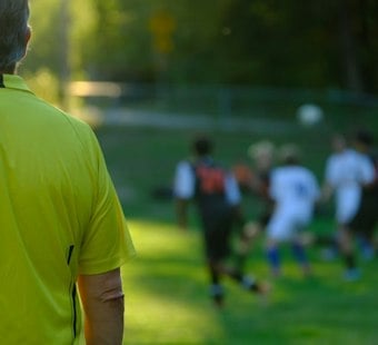 Dearborn Soccer Ref, 51, Breaks Neck After Errant Ball Strikes Head at U-D Jesuit Game