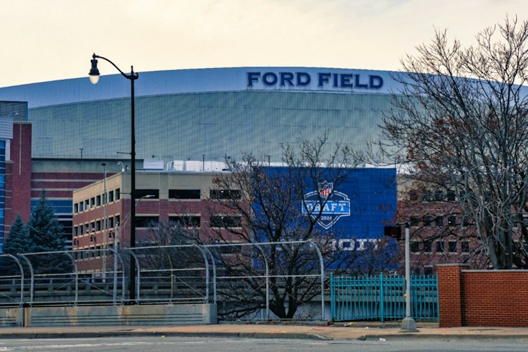 Detroit Lions Players, Roary Storm Belleville School to Cheer On Young Readers