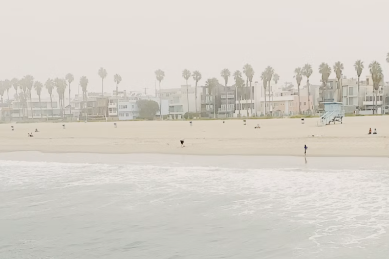 Downtown LA Basks Today, Braces for Soggy, Surf-Pounded Holiday Weekend