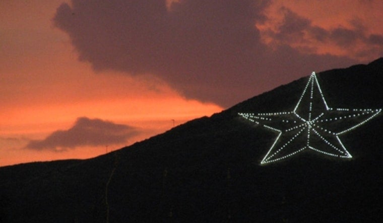 El Paso's Franklin Mountains Star Turns Light Blue for Karol G's Sun Bowl Run