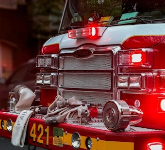 Four-Alarm Fire Tears Through Hawthorne Tire Shop, Crews Fight From Outside