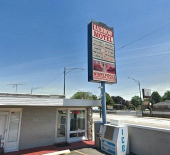 Garfield Ridge's 40-Foot Rainbow Motel Sign Faces Uncertain Fate