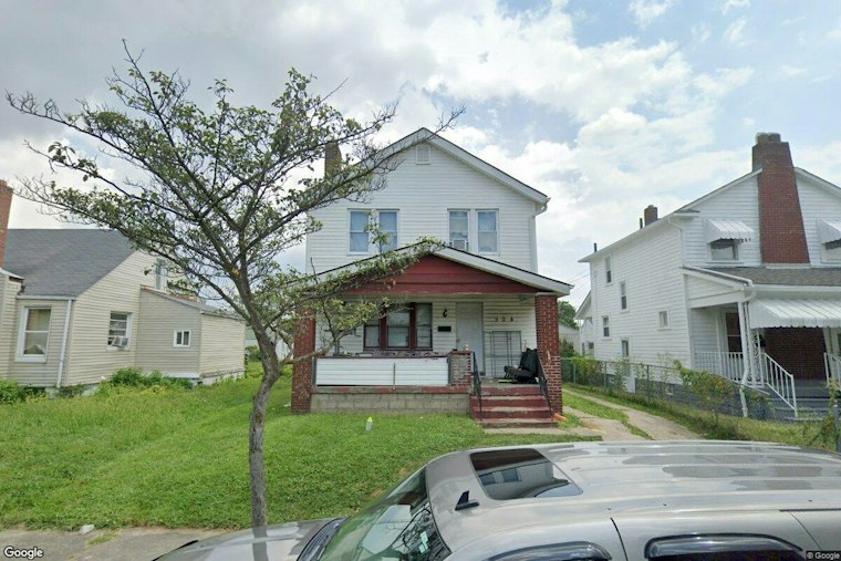 Hilltop Drug House Padlocked After Gun, Cocaine and Cash Found in Raids