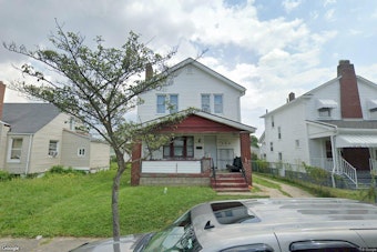 Hilltop Drug House Padlocked After Gun, Cocaine and Cash Found in Raids