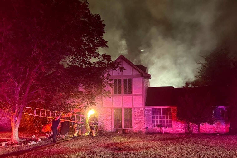 House Fire on Pasha Drive Sends Woman to Hospital, Crews Comb Home for Others