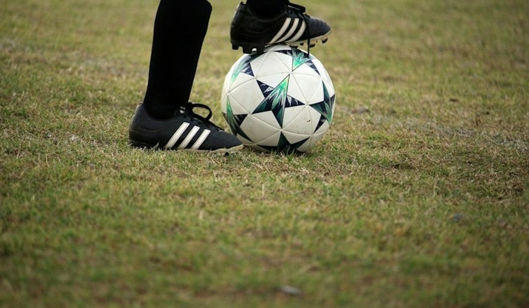 Houston Muralist Turns Dynamo Cleats Into Cancer-Awareness Canvas