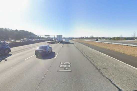 I-85 Crash Near Old Peachtree Road Shatters Barrier, Off-Duty Cops Help Driver