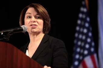 Klobuchar Pitches $180M Health Credit as Demuth Camp Fires Back on Costs