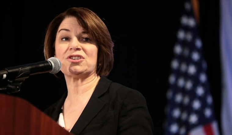 Klobuchar Pitches $180M Health Credit as Demuth Camp Fires Back on Costs
