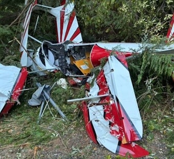 Lake Stevens Biplane Crashes Into Backyard, Narrowly Misses Family and Propane Tank