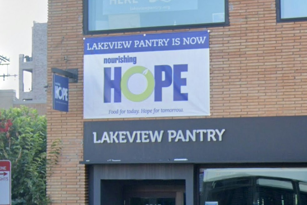 Lake View Artist Paints 80-Foot Mural at Nourishing Hope, Comes Full Circle
