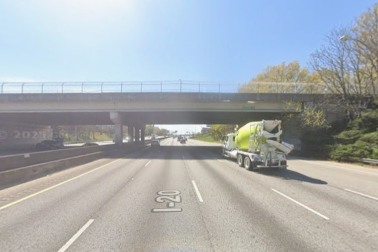 Legs Dangle From Car Wedged on Atlanta I-20 Overpass in Viral Video