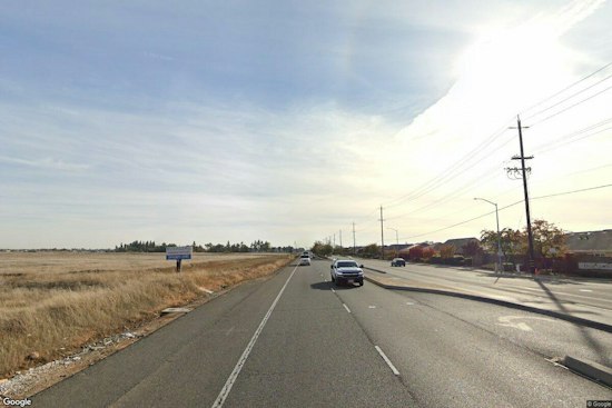Loose Excavator Bucket Smashes East Sacramento Overpass, Oil Sprays Car Behind