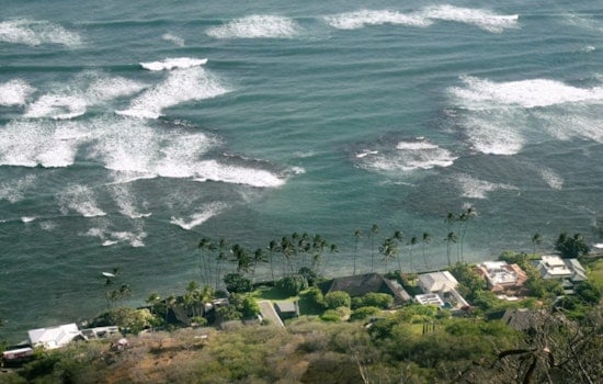 Lowell’s Parting Punch: Flooding Rains, 25-Foot Surf Slam Honolulu