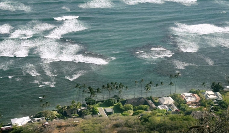 Lowell’s Parting Punch: Flooding Rains, 25-Foot Surf Slam Honolulu
