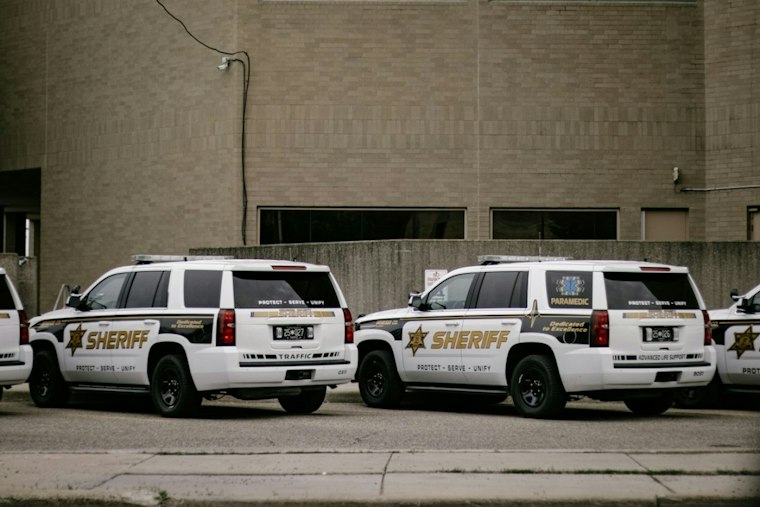 Macomb Township Man, 45, Held on $100K Bond After Guns, Pills, $16K Seized