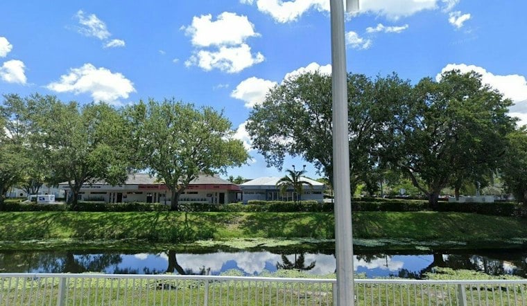 Man Found Dead in Car at Pembroke Pines Shopping Plaza, Police Cordon Off Lot