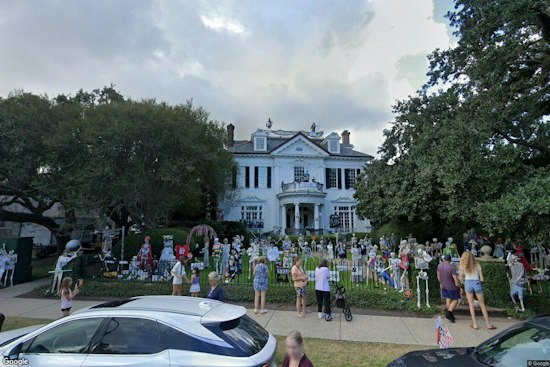 New Orleans Declares Dolly Day, Rolls a Skeleton Parade for Literacy