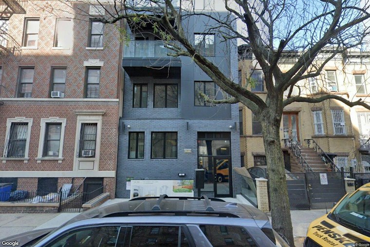 Nor'easter Winds Tear Facade Off Brooklyn Building, Trap Neighbors Outside