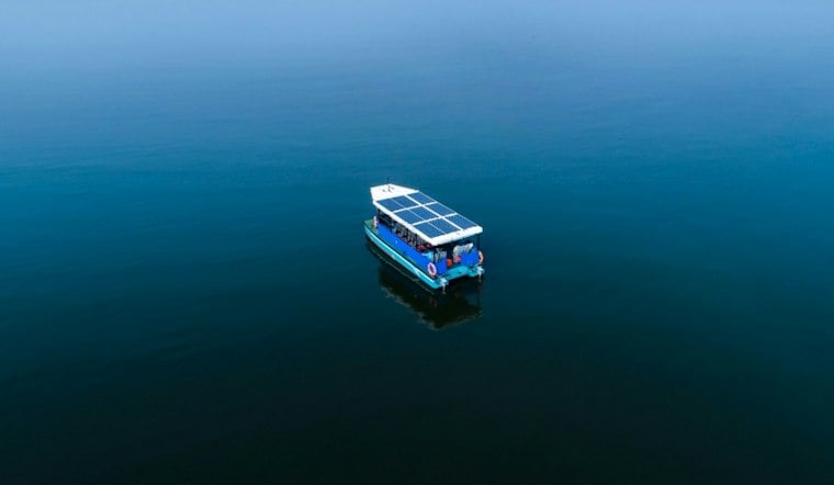 North Andover Inventor's Solar Boats Aim to Ditch Fumes, Noise for Good