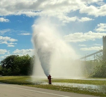 Pickup Crashes Onto Fire Hydrant Near McCully Hospital, Trapping Four