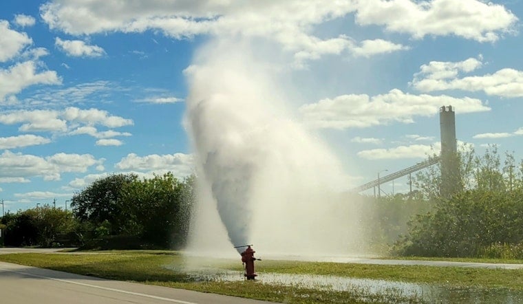 Pickup Crashes Onto Fire Hydrant Near McCully Hospital, Trapping Four