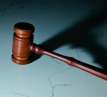Puna Man Indicted on 19 Counts After Five Guns Seized in Domestic Case